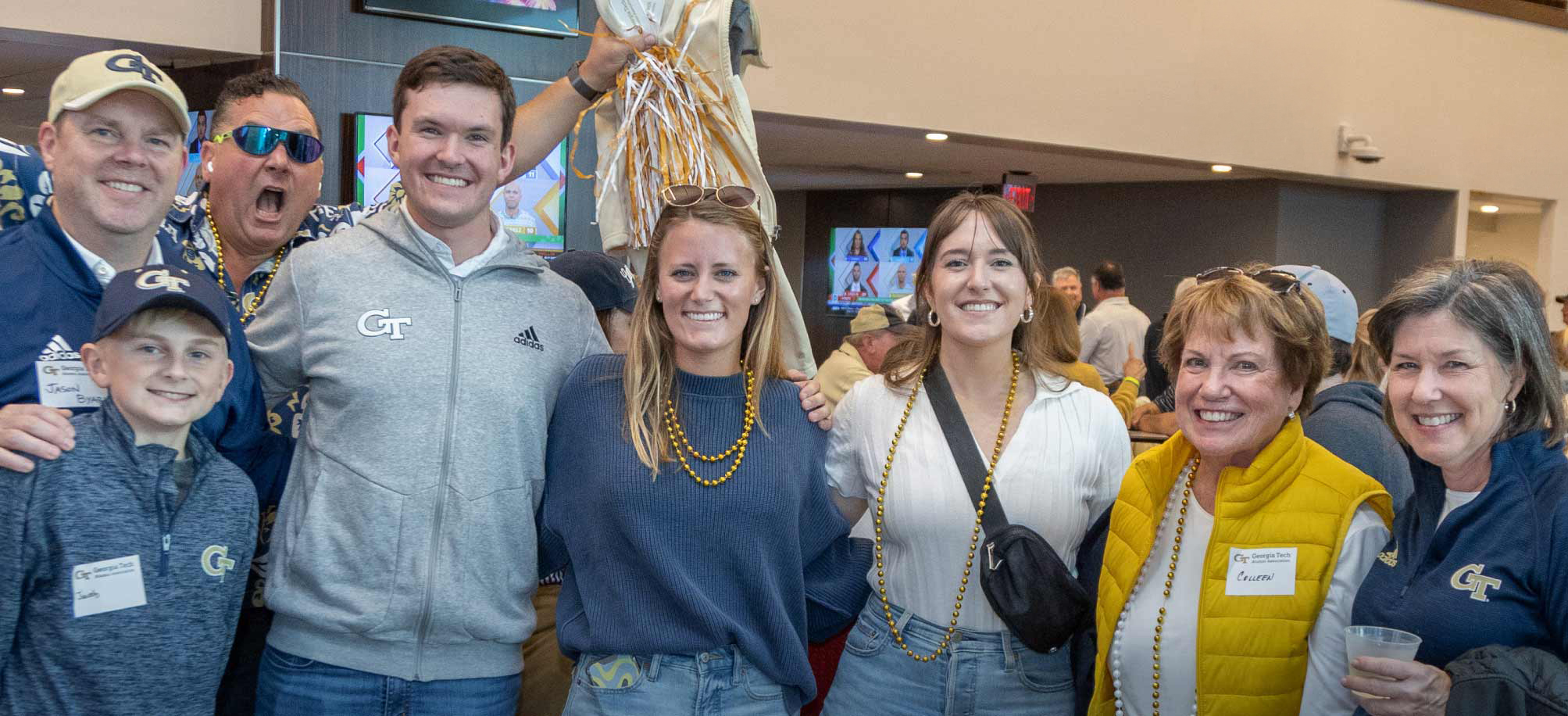 Alumni cheering on GT football together
